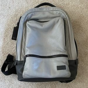 Slim leather laptop backpack by Tumi